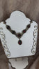 Video: Lucia Necklace in Garnet and Antiqued Brass by Rabbitwood and Reason