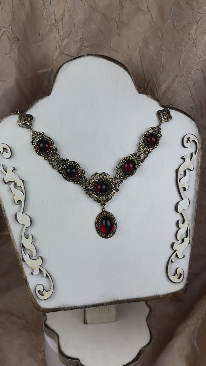 Video: Lucia Necklace in Garnet and Antiqued Brass by Rabbitwood and Reason