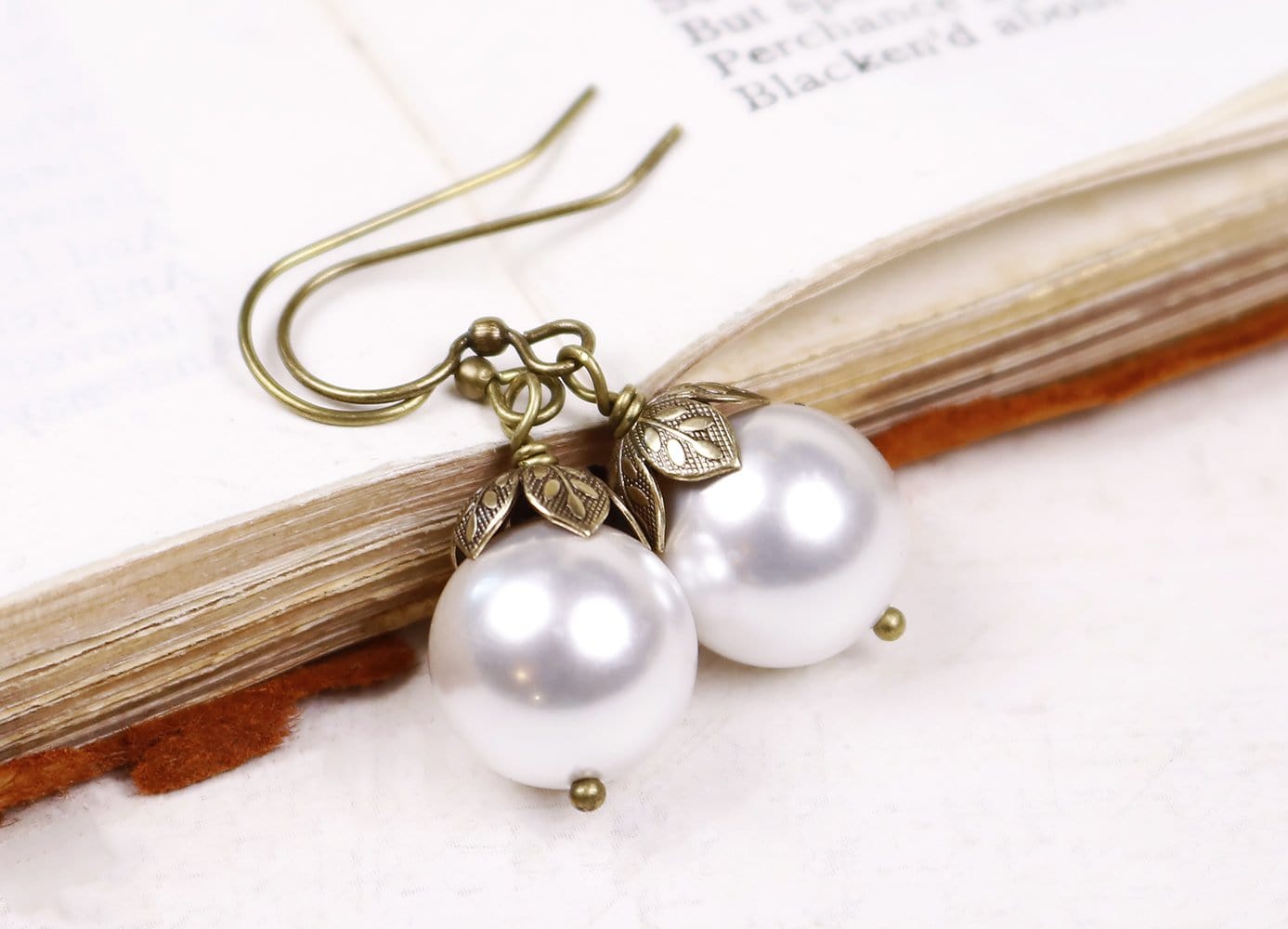 Aquitaine Pearl Drop Earrings in White Pearl and Antiqued Brass by Rabbitwood and Reason