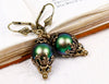 Borgia Earrings in Scarab Green Pearl and Antiqued Brass by Rabbitwood and Reason