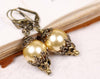 Borgia Earrings in Gold Pearl and Antiqued Brass by Rabbitwood and Reason