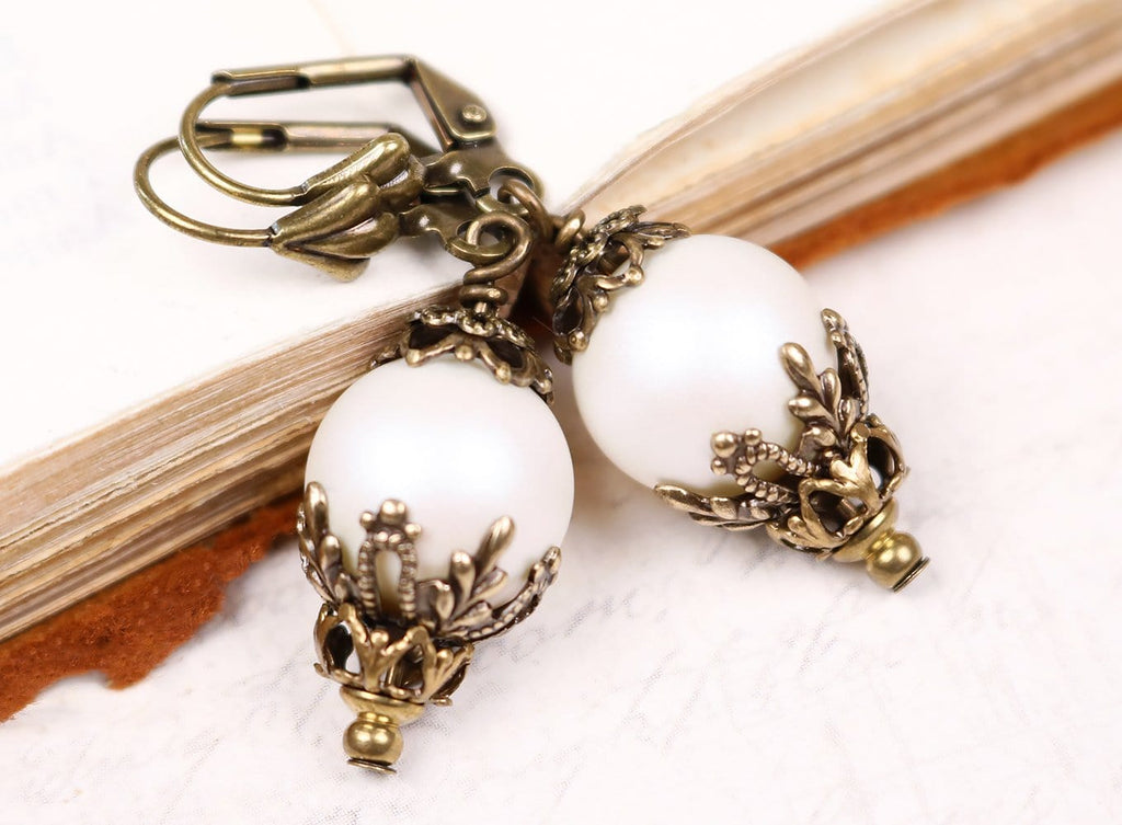 Borgia Earrings in Pearlescent White Pearl and Antiqued Brass by Rabbitwood and Reason