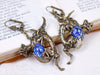 Dragon Earrings in Sea Opal and Antiqued Brass by Rabbitwood and Reason
