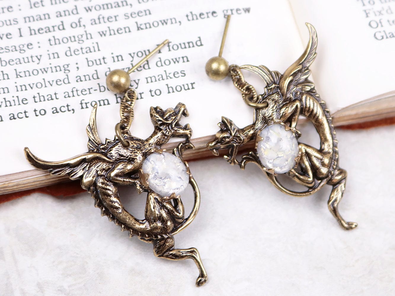 Dragon Earrings in Snow Opal and Antiqued Brass by Rabbitwood and Reason