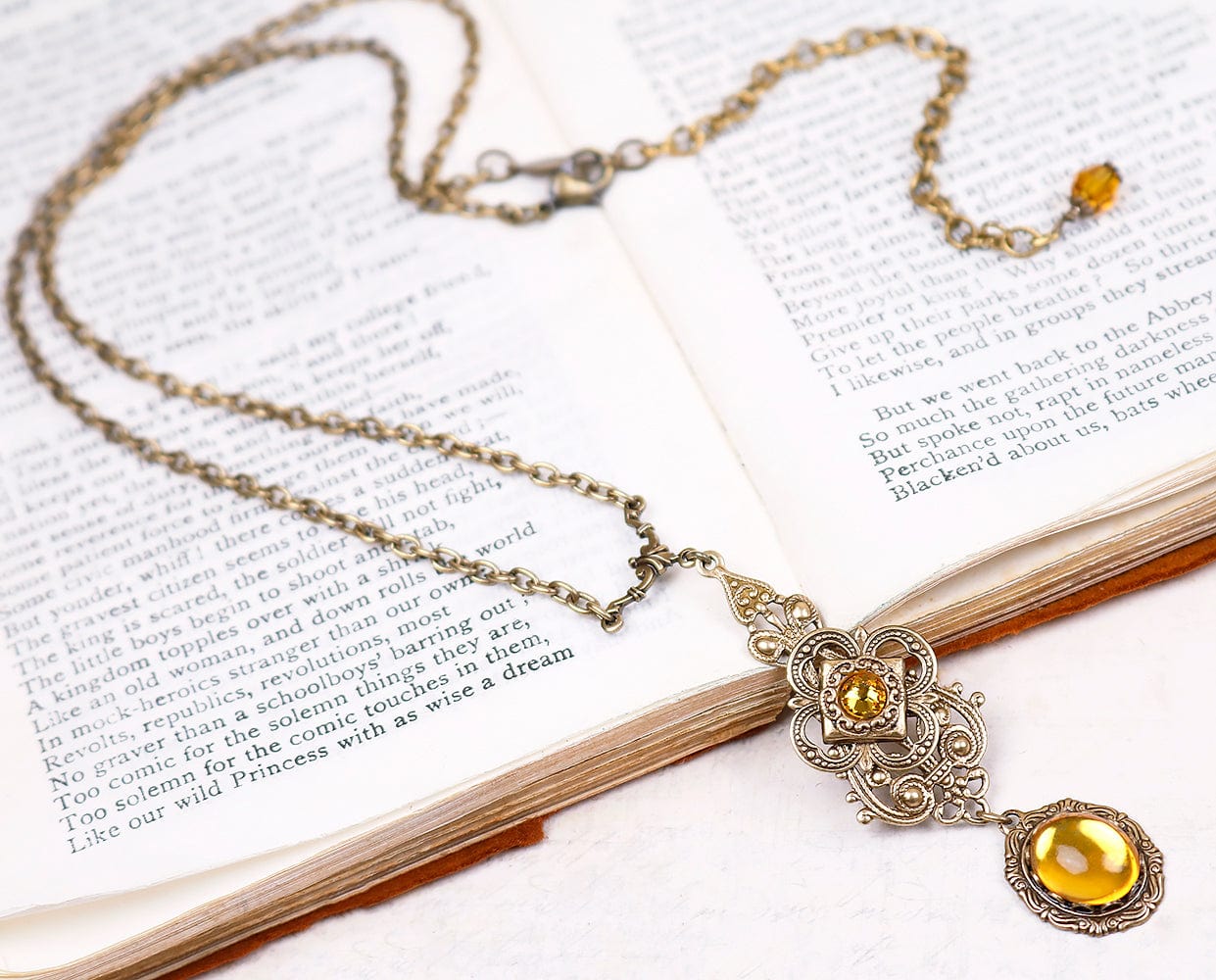 Avalon Pendant Necklace in Topaz and Antiqued Brass by Rabbitwood and Reason