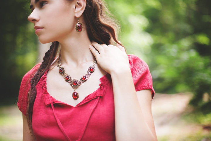 Lucia Necklace - Ruby - Antiqued Brass - Rabbitwood & Reason - Photo: La Candella Weddings