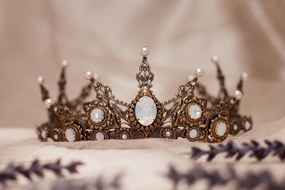 Avalon Pearl Tiara in Antiqued Brass by Rabbitwood and Reason.  Stones featured: White Opal, Crystal, Cream Pearl.  Photo by La Candella Weddings